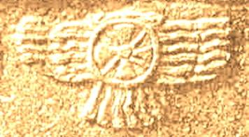 :Nimrud_stele_winged_sun.jpg